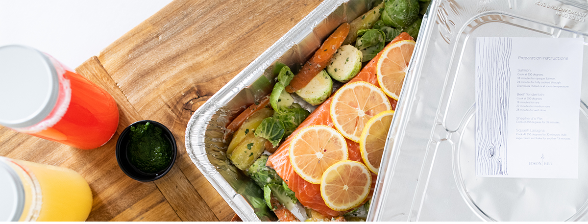 Edson Hill To Go Salmon with lemon potatoes and lettuce.